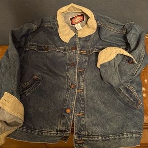 Men’s XL Jean jacket with tan collar and tan underneath cuffs.